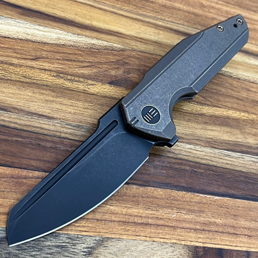 We Knife Starhawk 2.81" Flipping Knife w/ Black Blade & Bronze Titanium Handle