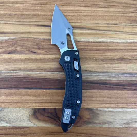 Microtech M-Stitch 3.5" Folding Knife w/ RAM0LOK Black Frag Aluminum Handle