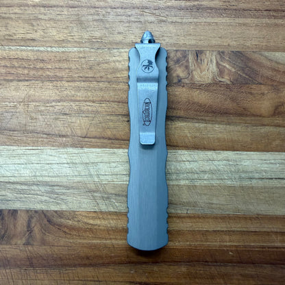 Microtech Dirac D/E 3" OTF Apocalyptic w/ Natural Clear Handle