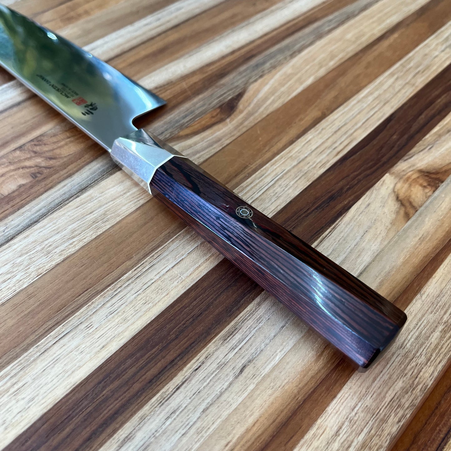 Mcusta Zanmai Supreme Twisted 180mm Santoku