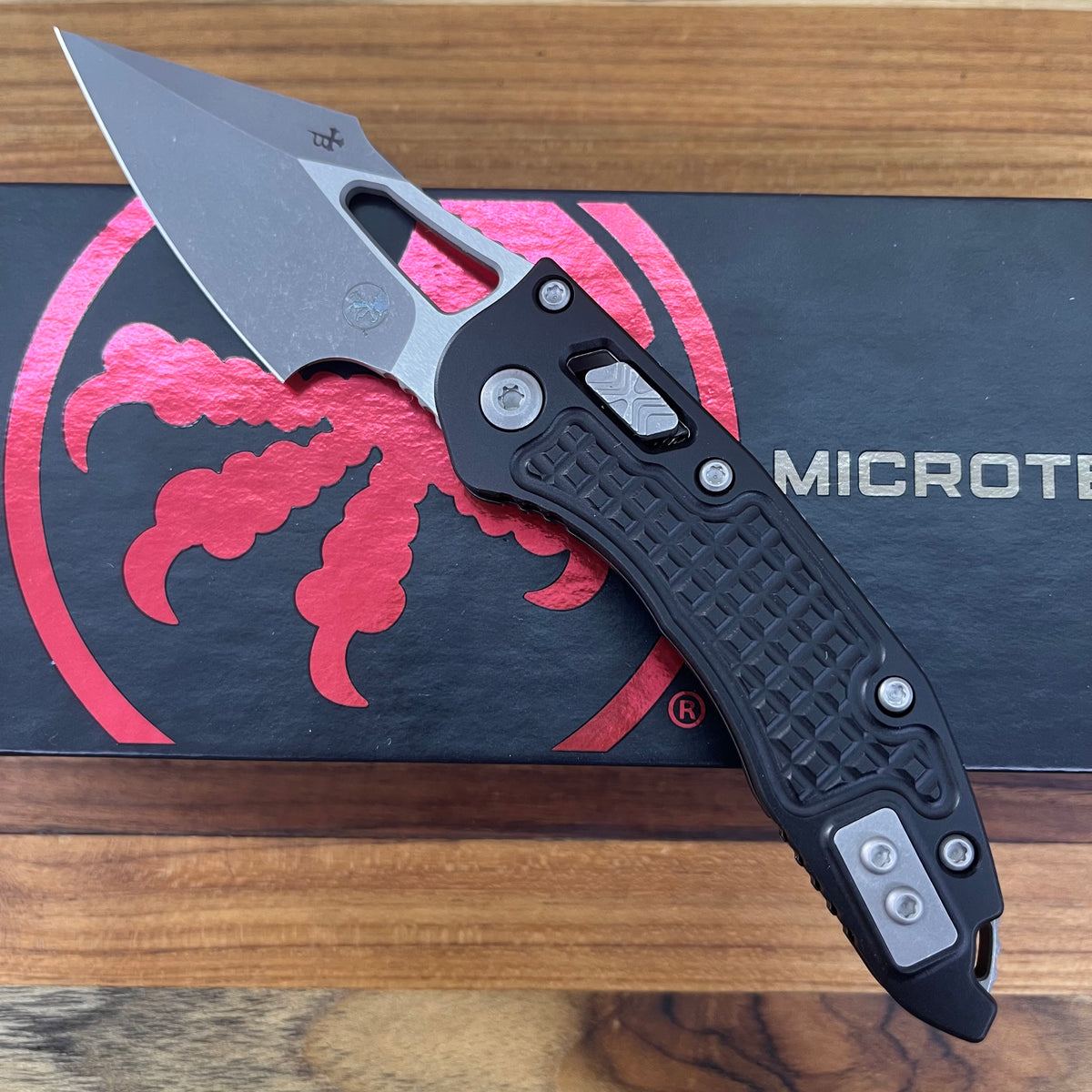 Microtech M-Stitch 3.5" Folding Knife w/ RAM0LOK Black Frag Aluminum Handle