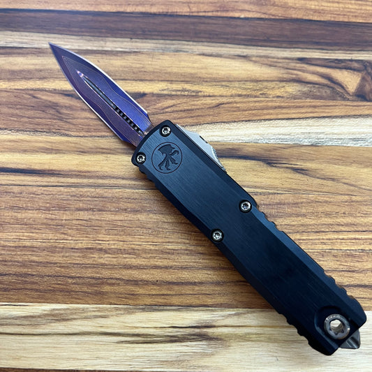 Microtech UTX-85 Gen III D/E 3" OTF Marfione Select Blued Baker Forge Coppermai Damascus w/ Purple Titanium Accent