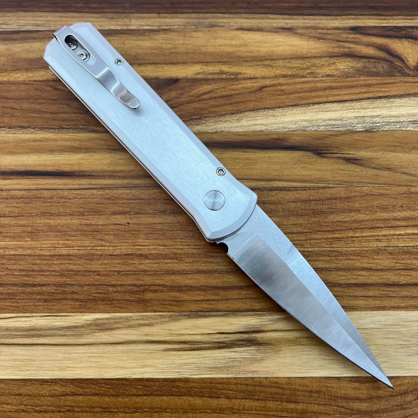 Pro-Tech Godson 3.15" Auto w/ Crosscut Carbon Fiber Inlay on Silver Aluminum & Black Lip Pearl Button