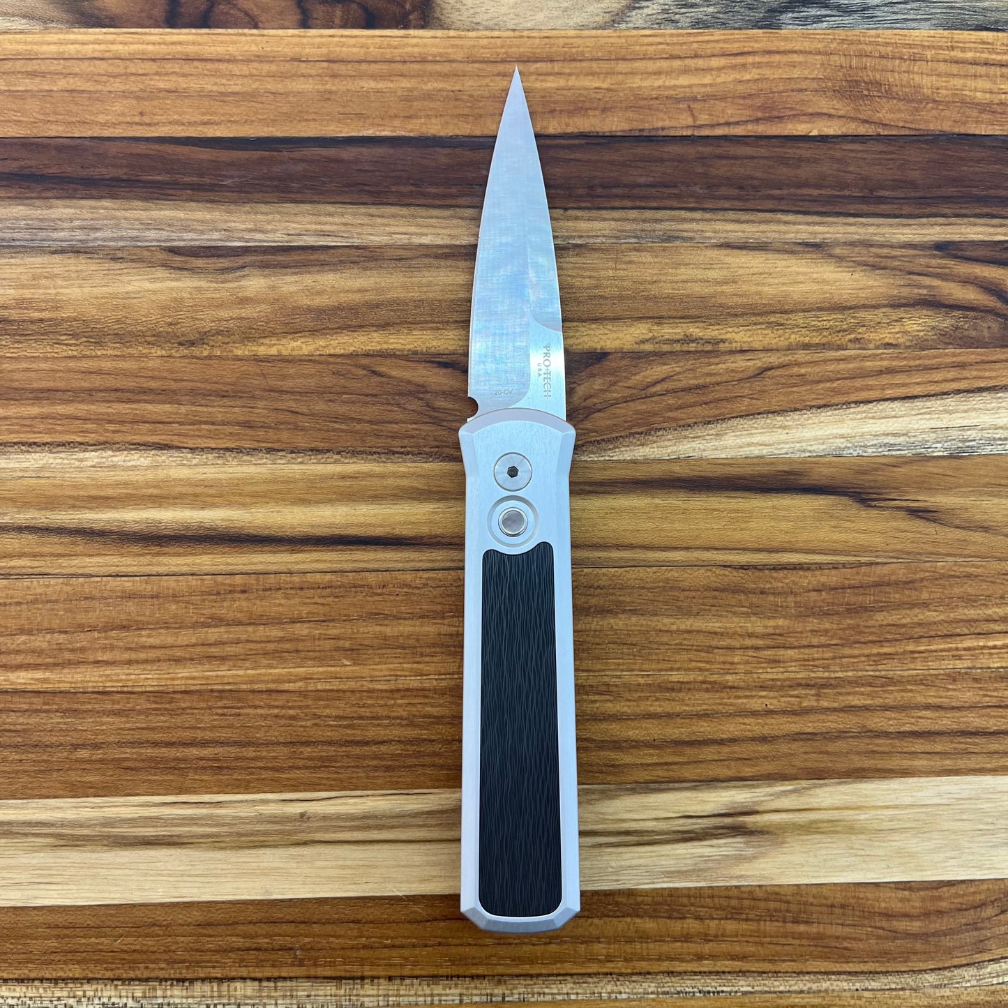 Pro-Tech Godson 3.15" Auto w/ Crosscut Carbon Fiber Inlay on Silver Aluminum & Black Lip Pearl Button