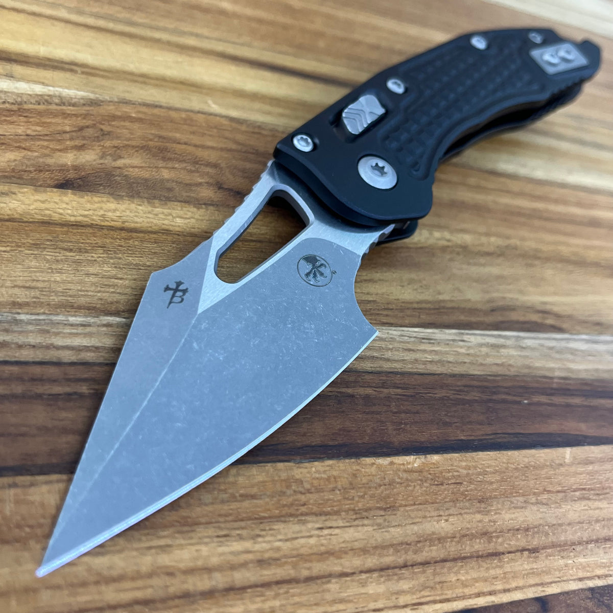 Microtech M-Stitch 3.5" Folding Knife w/ RAM0LOK Black Frag Aluminum Handle