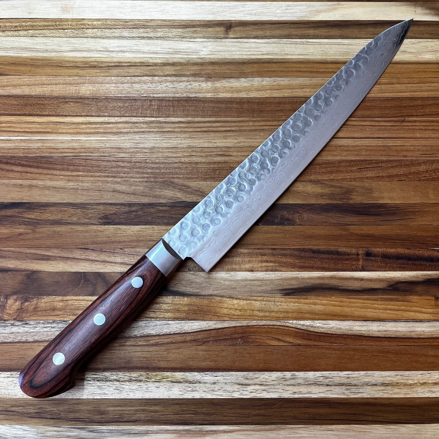 Kikuichi Warikomi Damascus Tsuchime 240mm (9.5") Sujihiki