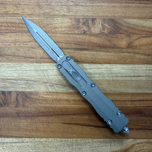 Microtech Dirac D/E 3" OTF Apocalyptic w/ Natural Clear Handle