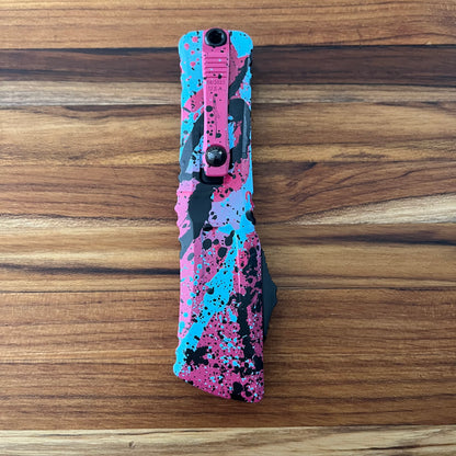 Microtech Combat Troodon Gen III D/E 4" OTF w/ Pink/Blue Black Splatter Aluminum Handle
