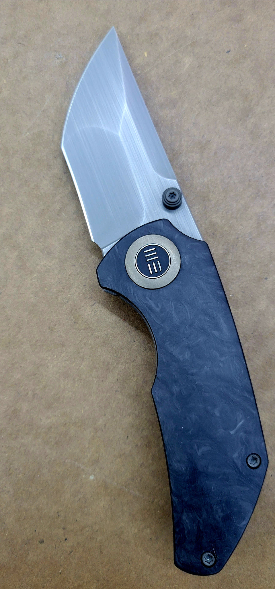We Knife 2103A Marbled Carbon Fiber Titanium Thug