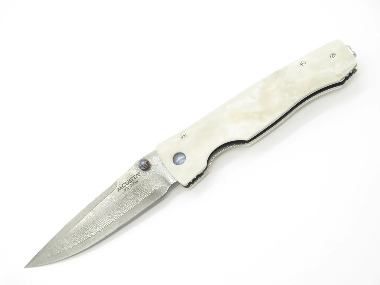 Mcusta MC-0126D Tactility Elite Corian VG10 Folder