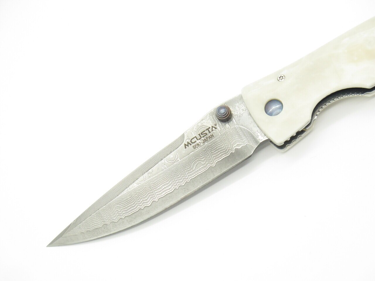 Mcusta MC-0126D Tactility Elite Corian VG10 Folder